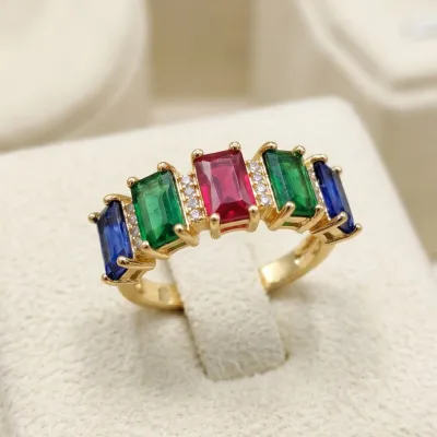 vibrant gold ring adorned with colorful gemstones,