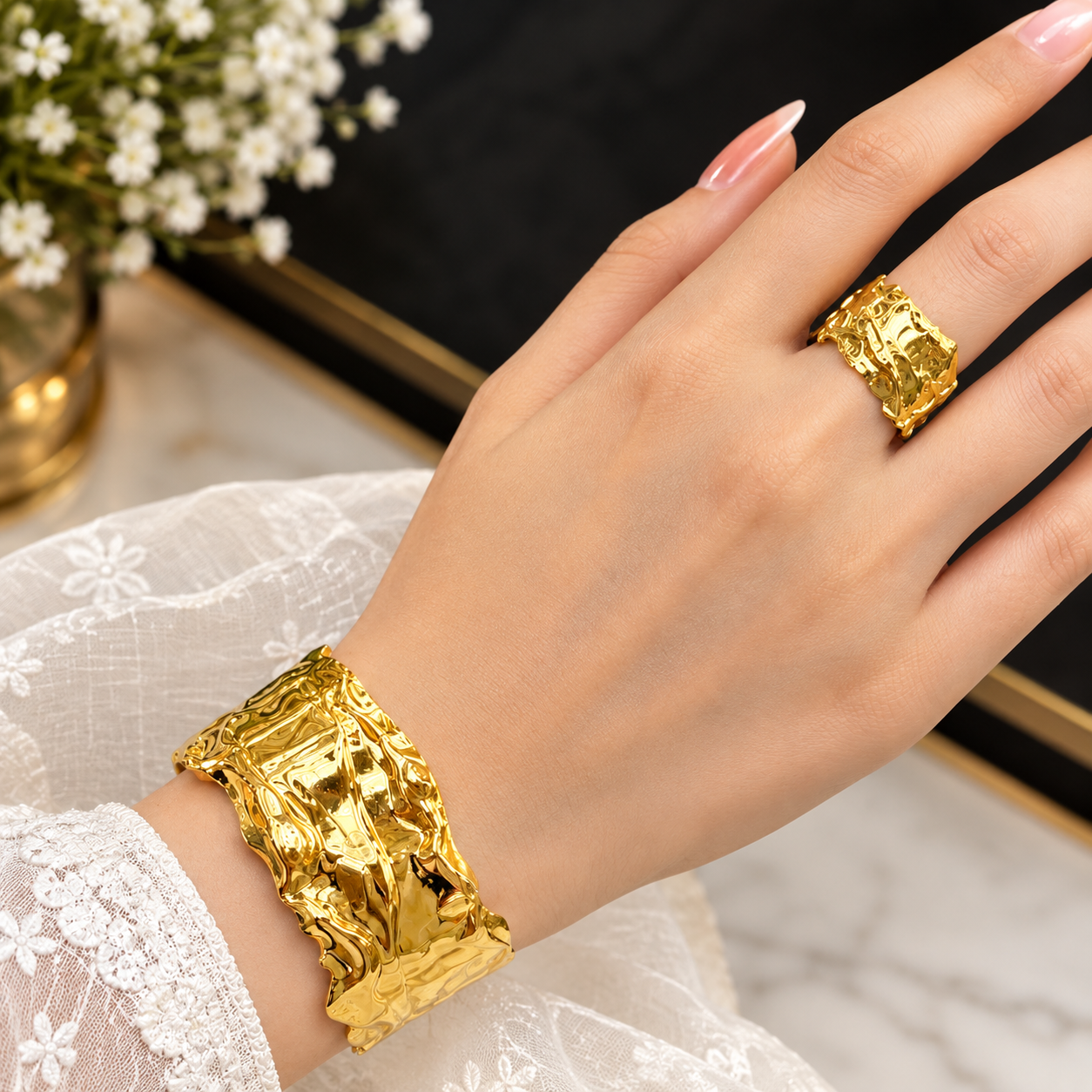 A glossy, golden, crumpled-texture jewellery set to bring out a regal elegance in your look!