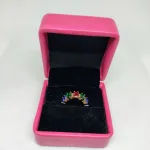 vibrant gold ring adorned with colorful gemstones,