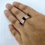 vibrant gold ring adorned with colorful gemstones.