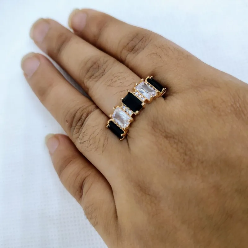 vibrant gold ring adorned with colorful gemstones.