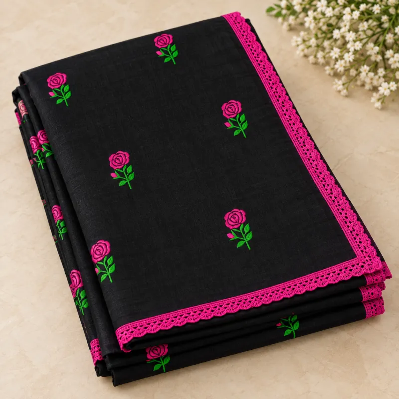 Glamorous Black Cotton Saree with Rose Embroidery & Pink Lace Border